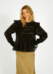 You added <b><u>IM Ganael Ruffle Blouse in Black</u></b> to your cart.